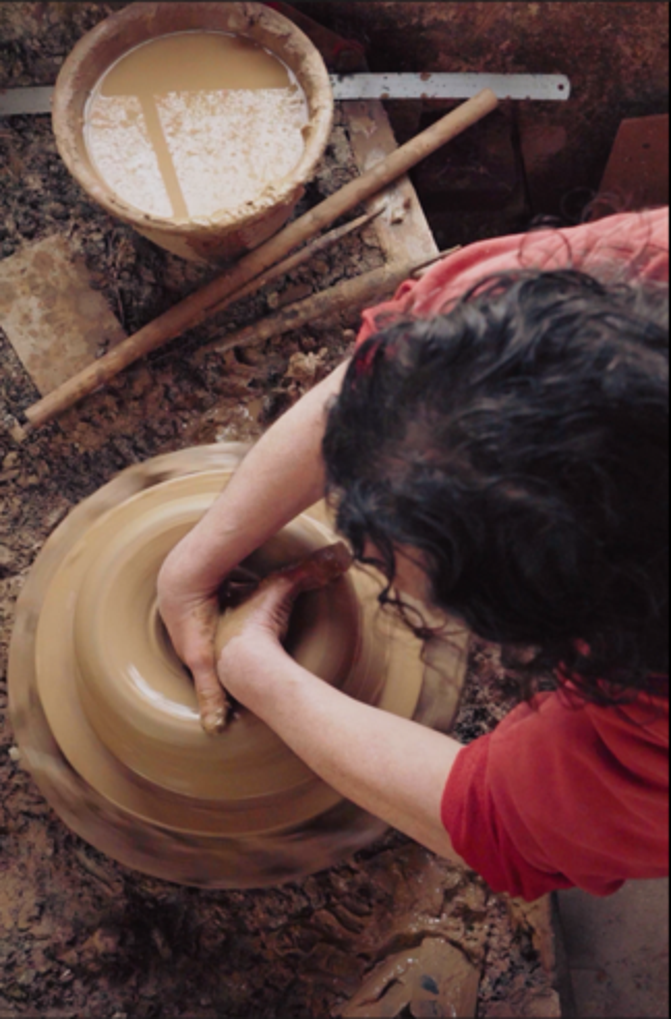 Heritage potter hand throwing a chimney pot